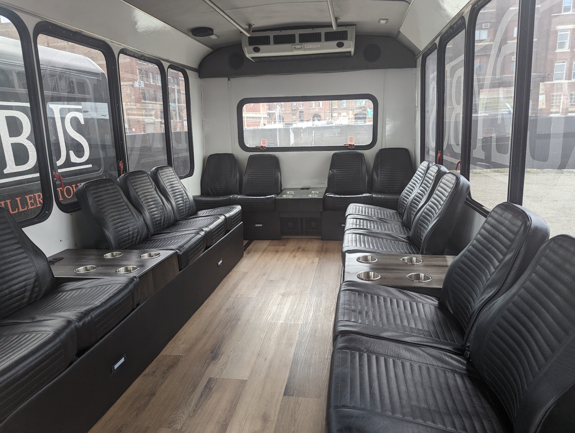 14-passenger party bus interior with leather seating