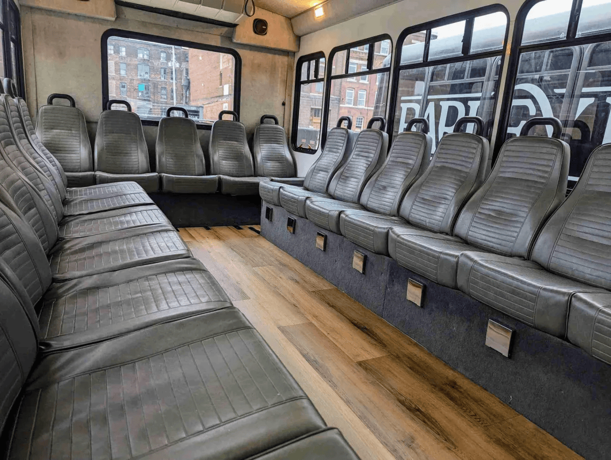 20-passenger party bus interior with hardwood floors