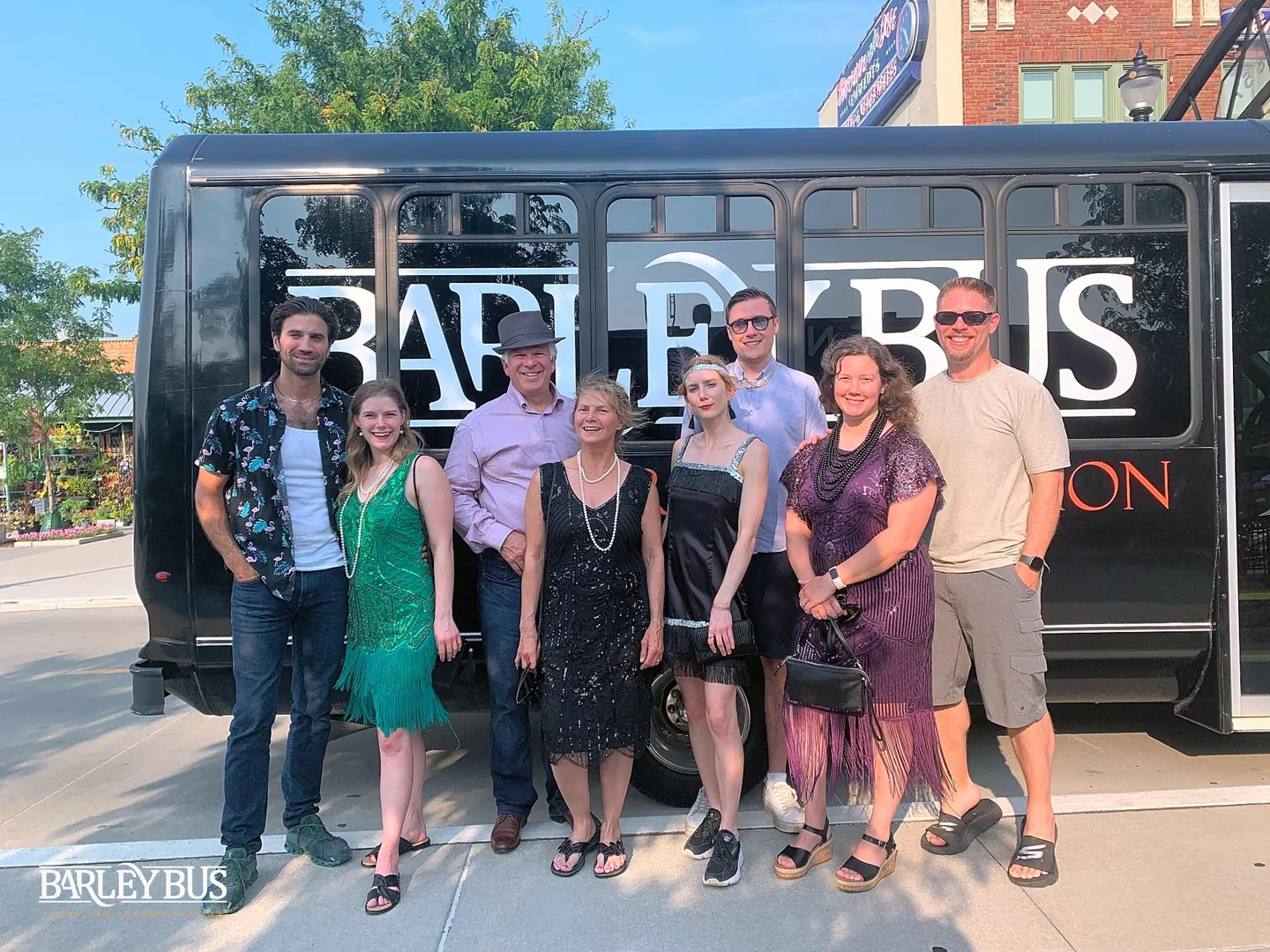 Flapper-dressed group outside the Barley Bus on the Ghost & Gangsters tour